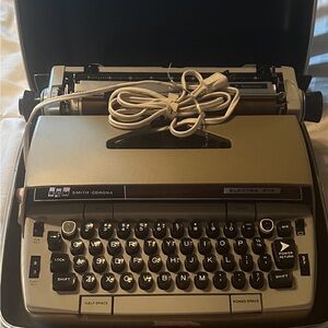 Vintage 1960s Smith-Corona Typewriter in Black and Gray